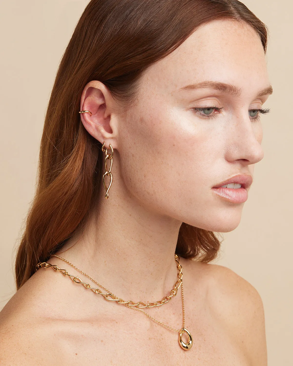 Infinite Drop Stud Earrings in Gold