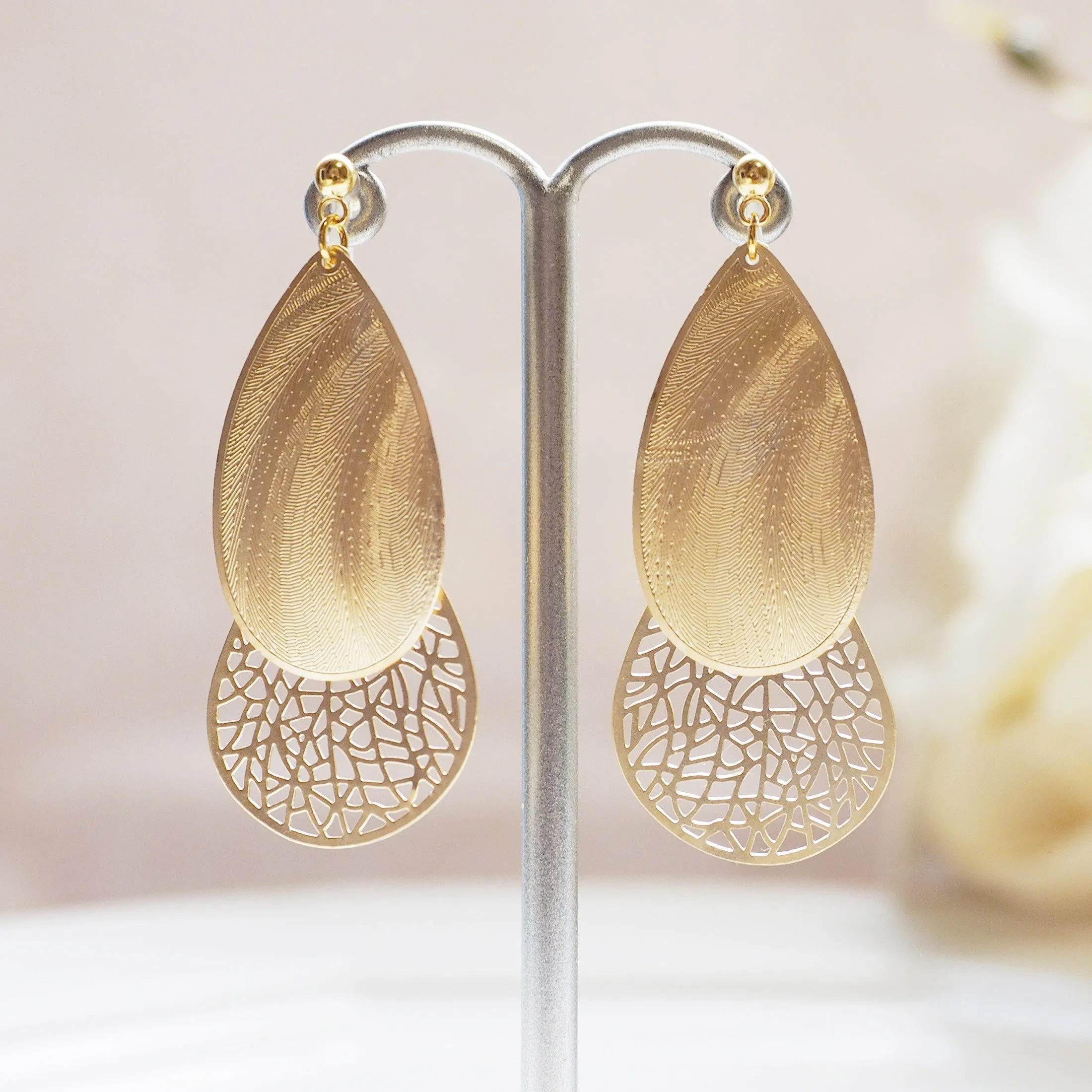 Textured gold metal and teardrop filigree invisible clip on earrings