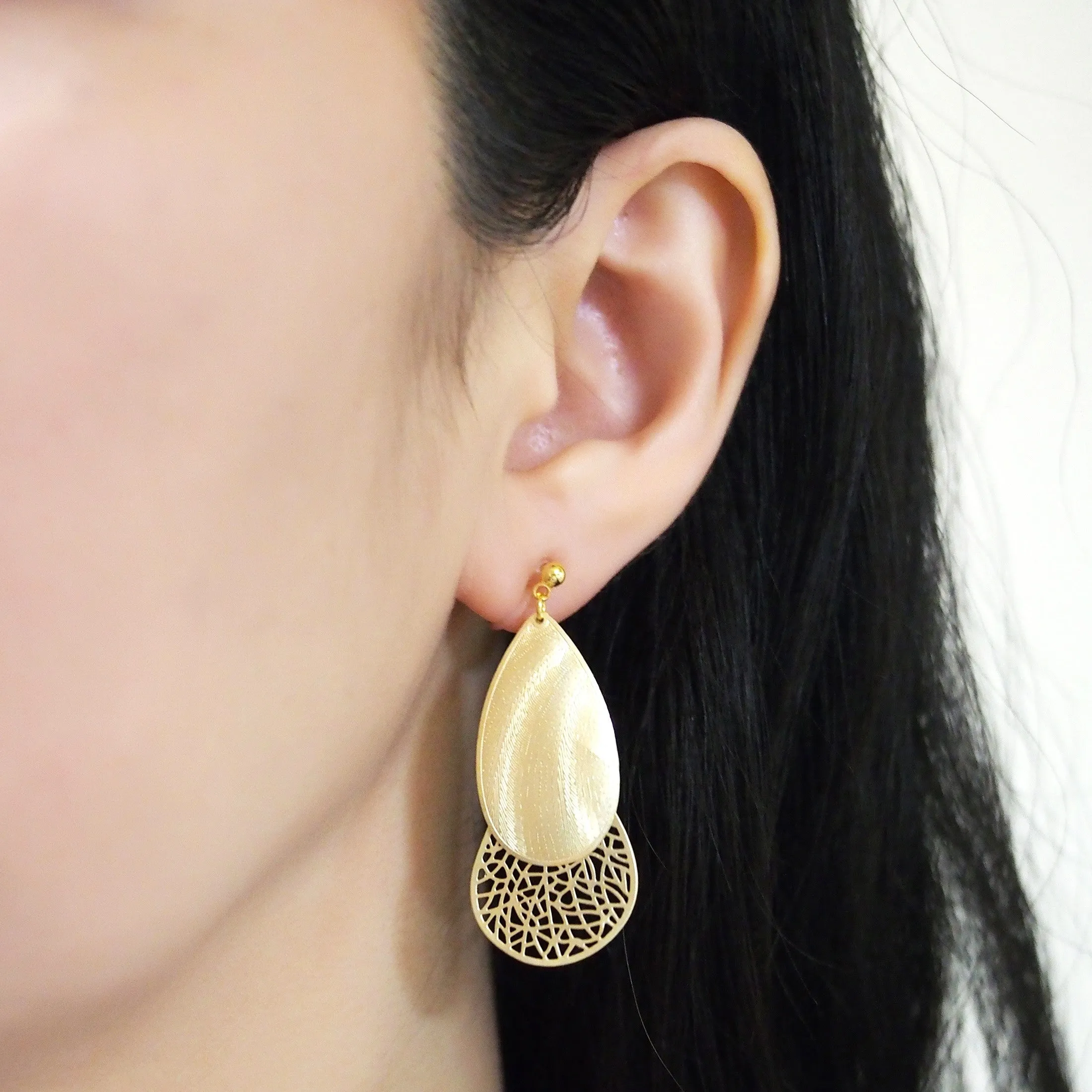 Textured gold metal and teardrop filigree invisible clip on earrings