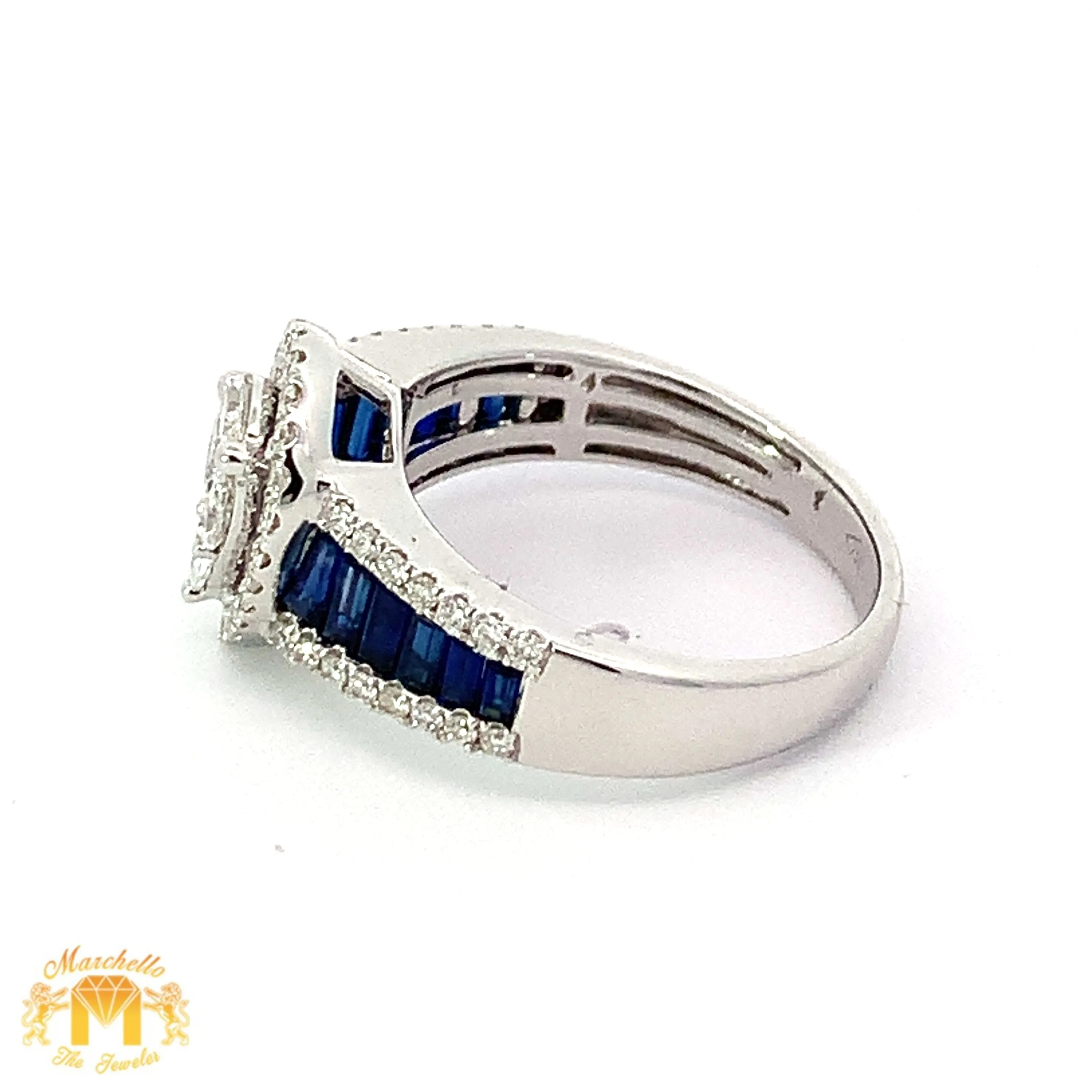 VVS/vs EF color high clarity diamonds set in a 18k Gold Pear Shaped Ring with Blue Sapphire